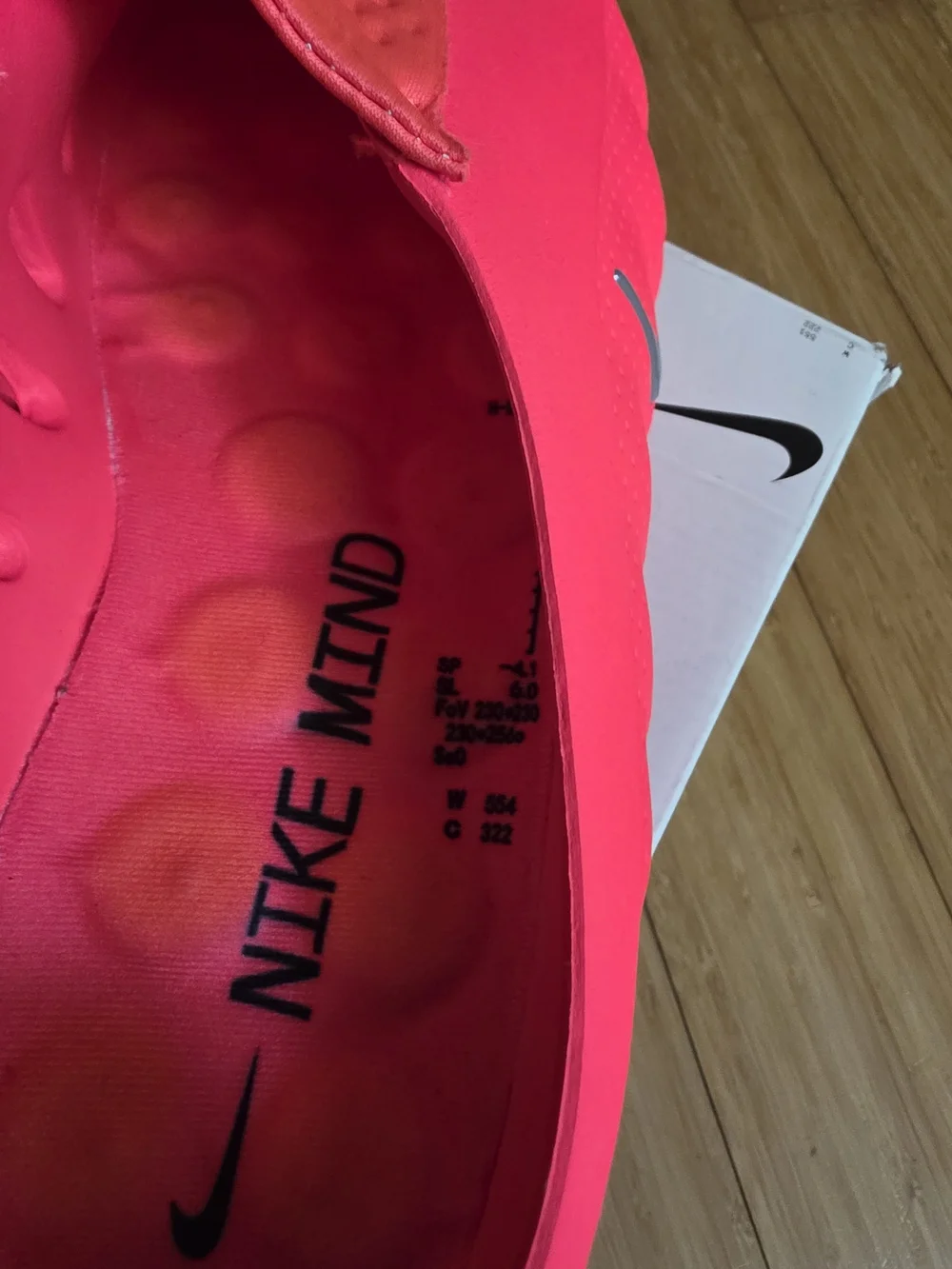 Nike Neon Pink Slip-On Athletic Shoes with Silver Swoosh
